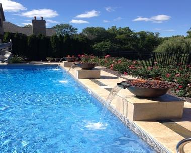 beautiful swimming pool with decorative fountains